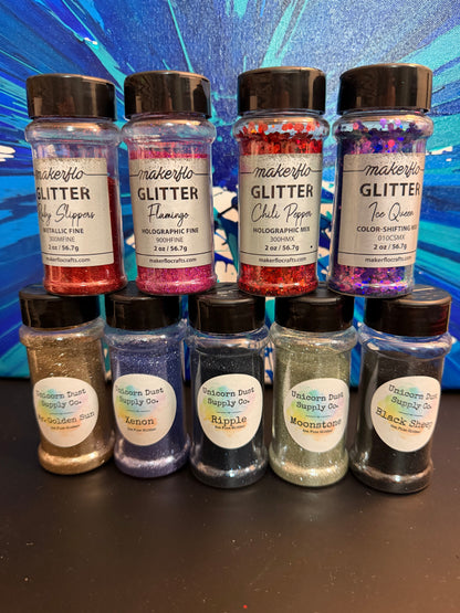 Set of Nine bottles of glitter ￼